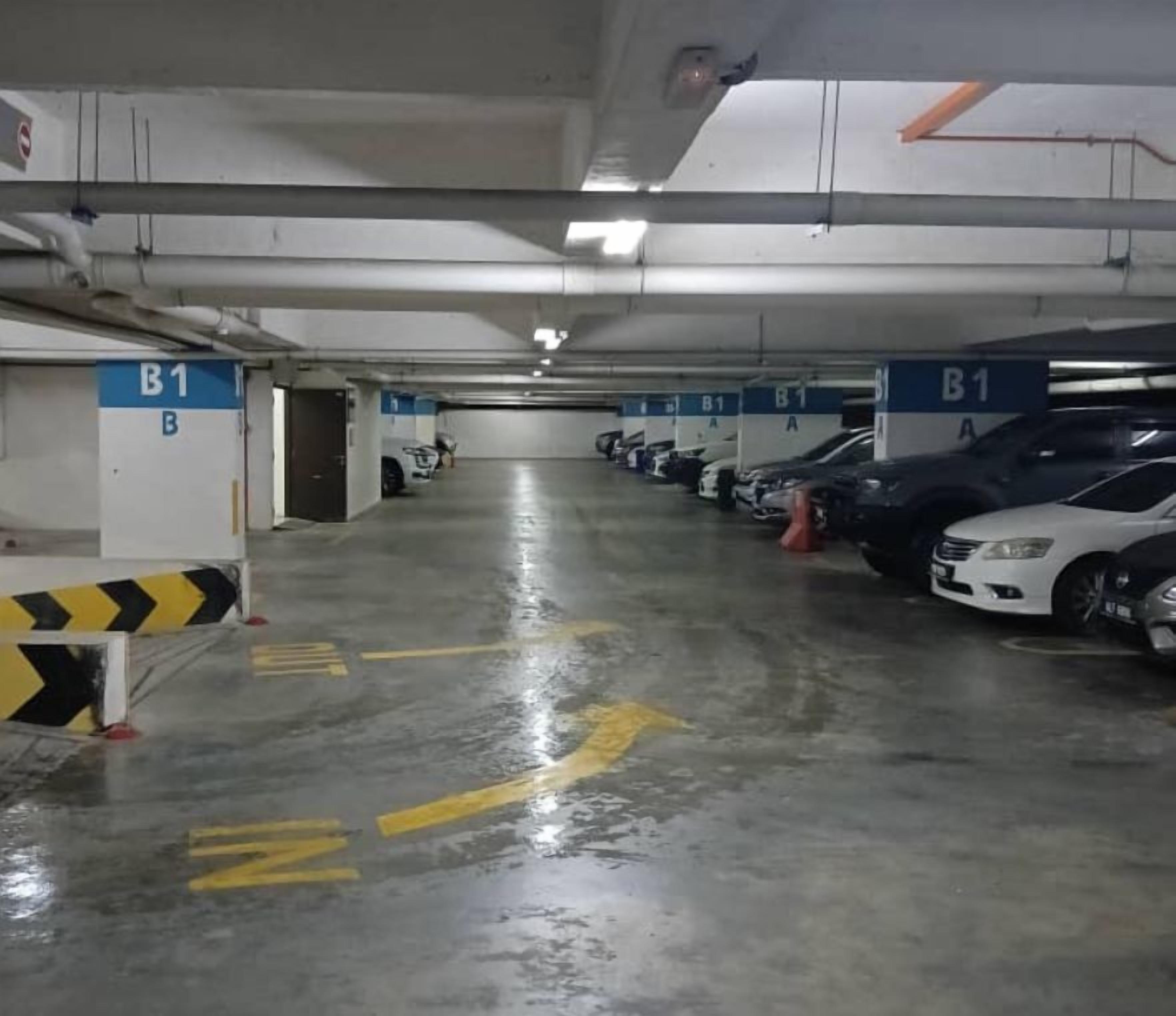 A multi-level parking garage with clearly marked parking bays B1 and A1.