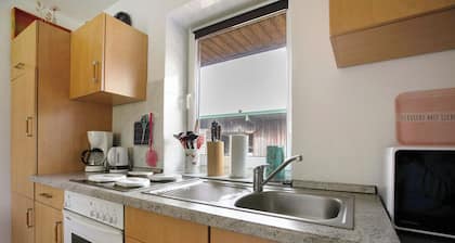 Apartment 'Ferienwohnung Achtern Diek' with Private Terrace, Shared Garden and Wi-Fi