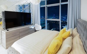 1 bedroom, desk, iron/ironing board, travel crib