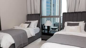 2 bedrooms, desk, iron/ironing board, travel crib