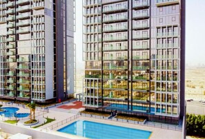 Exterior - Stylish Cozy Studio in Bloom Towers, Jumeirah Village Circle – Modern Comfort & City Views (Cosy Studio Apartment in Bloom Towers, Jumeirah Village Circle)