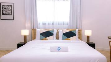 1 bedroom, desk, iron/ironing board, travel crib