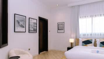 1 bedroom, desk, iron/ironing board, travel crib