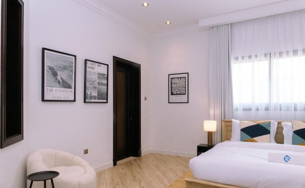 1 bedroom, desk, iron/ironing board, travel crib