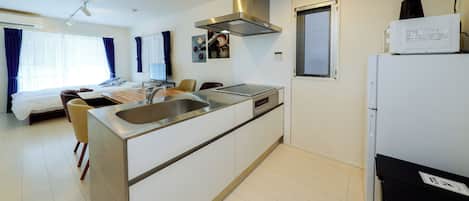 4-person Accomodation, 201, Non Smoking | Private kitchen | Fridge, microwave, stovetop, cookware/dishes/utensils
