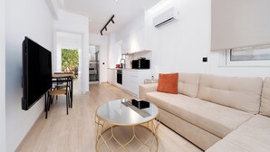 Căn hộ Deluxe, 1 phòng ngủ, sân hiên, quang cảnh vườn | Khu phòng khách