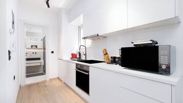 Appartement Deluxe, 1 chambre, patio, vue jardin | Cuisine privée