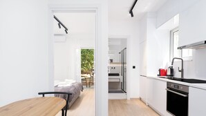 Căn hộ Deluxe, 1 phòng ngủ, sân hiên, quang cảnh vườn | Phòng ăn
