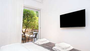 Appartement Deluxe, 1 chambre, patio, vue jardin | Vue de la chambre