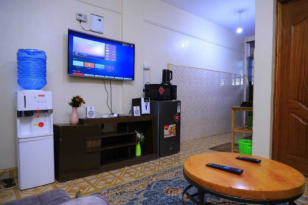 デラックス アパートメント シティビュー | 専用キッチン | 冷蔵庫、電子レンジ、調理器具と食器