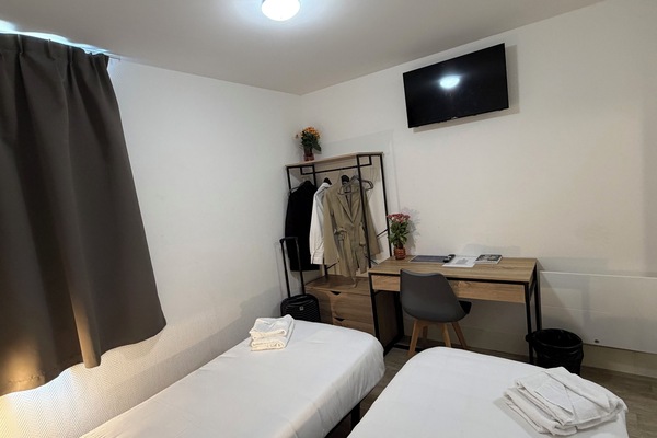 Twin kamer | Geluiddichte muren, beddengoed