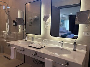 Deluxe Studio Suite, Balcony, Pool View | In-room safe, desk, laptop workspace, soundproofing - Hudor Resort (Bauang)