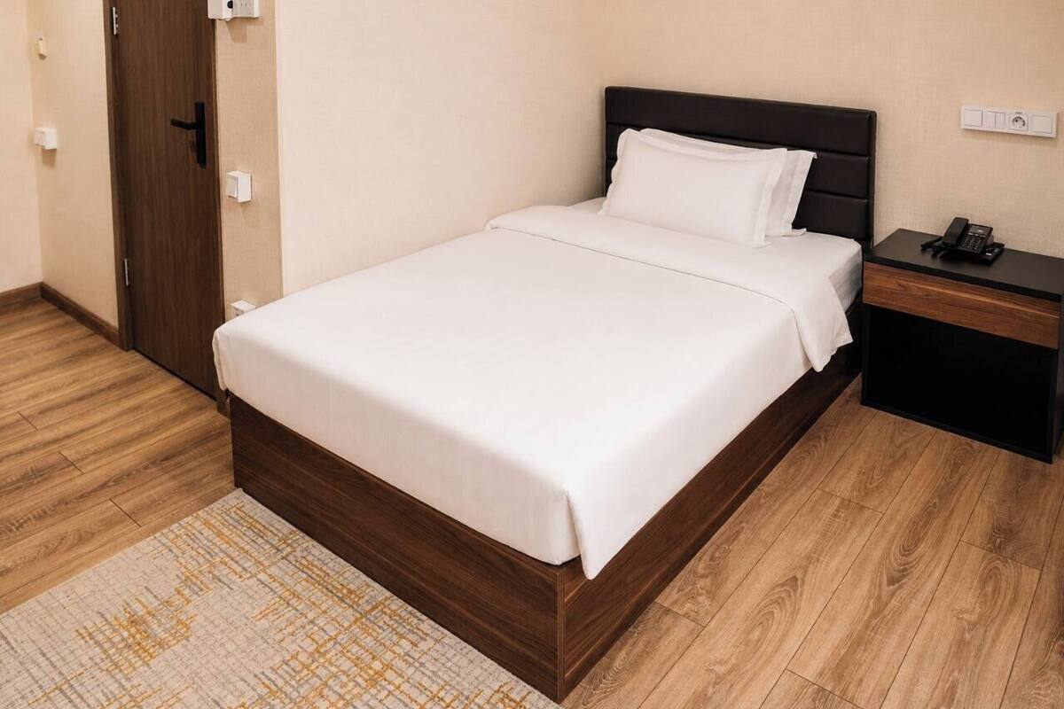 Habitación individual estándar | Ropa de cama de alta calidad, colchones viscoelásticos, minibar