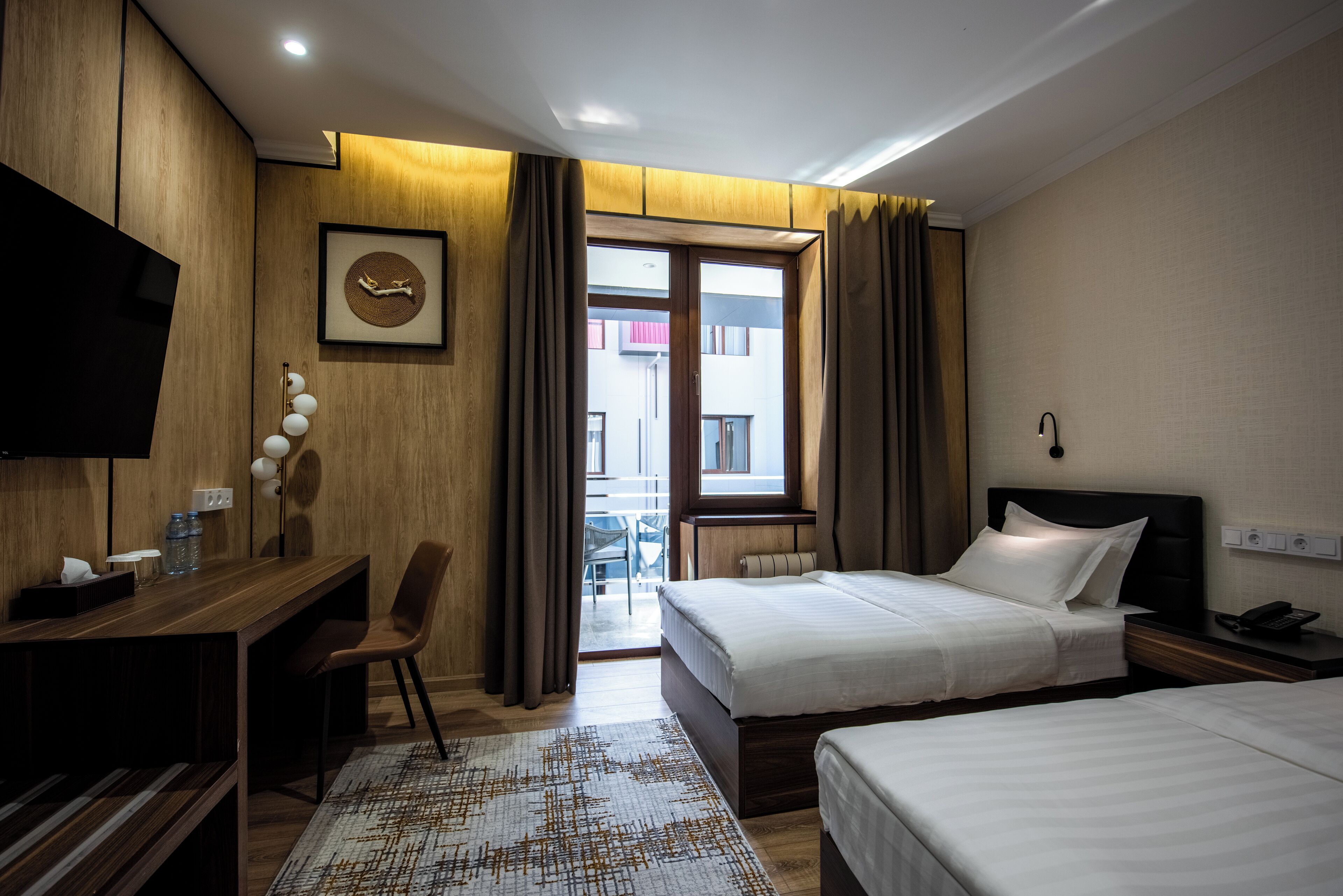 Luxe beddengoed, een kluis op de kamer, individueel gedecoreerd