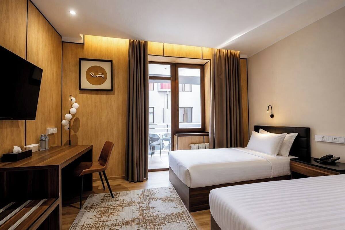 Habitación superior con 2 camas individuales | Ropa de cama de alta calidad, colchones viscoelásticos, minibar