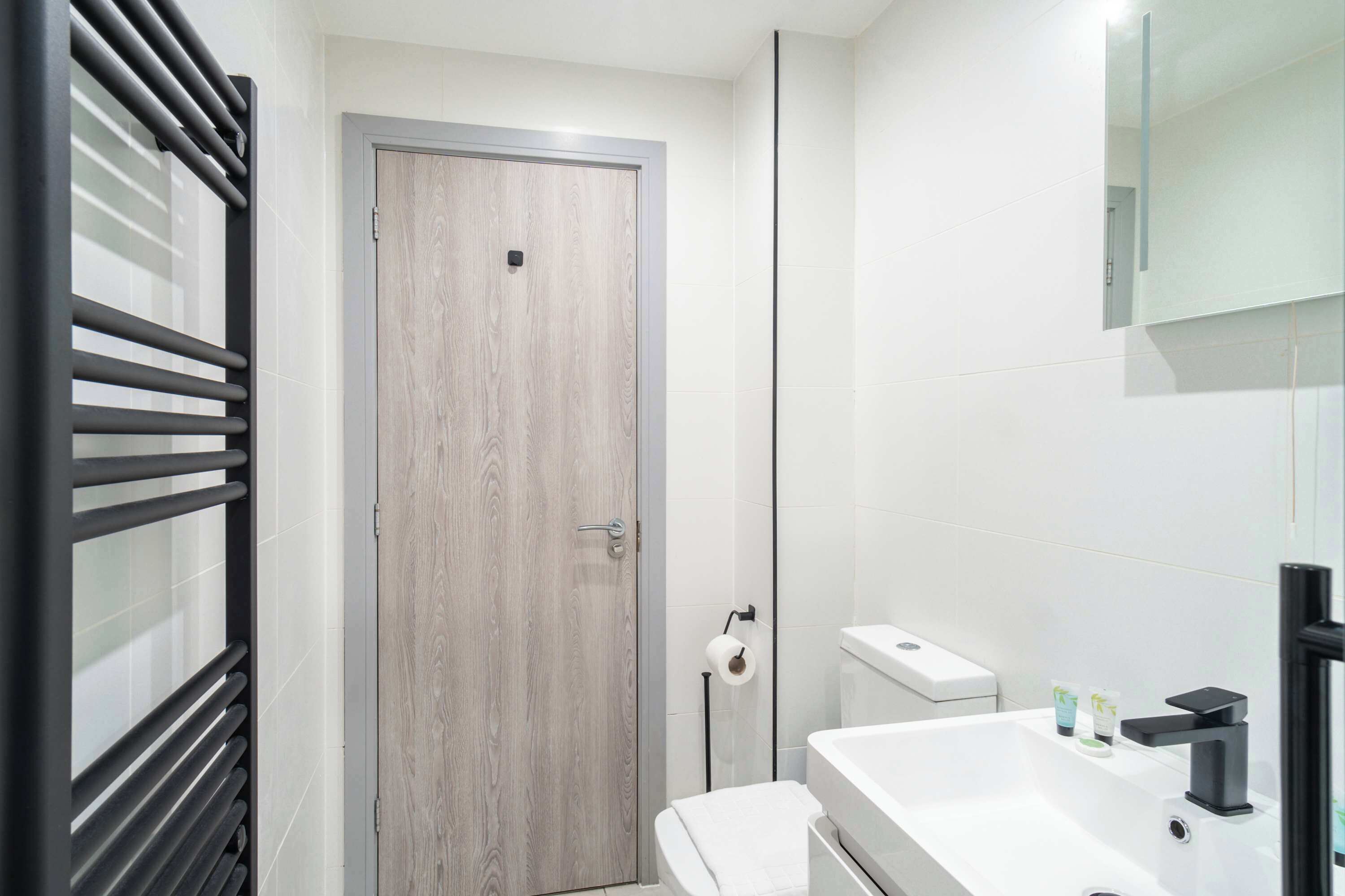 Shower, hair dryer, towels, shampoo