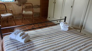 1 bedroom, desk, iron/ironing board, travel crib