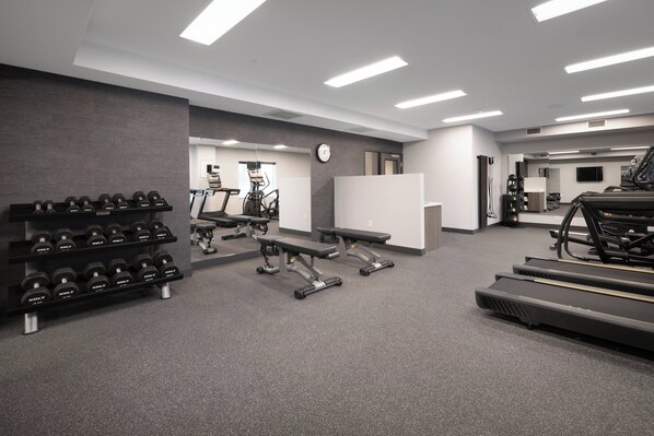 A modern gym with treadmills, dumbbells, and exercise equipment. - Atwell Suites Henderson by IHG (Henderson)