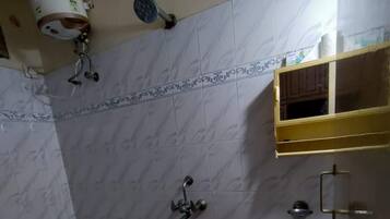 Shower, towels, toilet paper