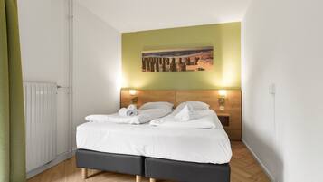 3 slaapkamers, een strijkplank/strijkijzer, gratis wifi