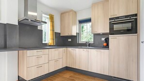 Coffee/tea maker, toaster, high chair, dining tables
