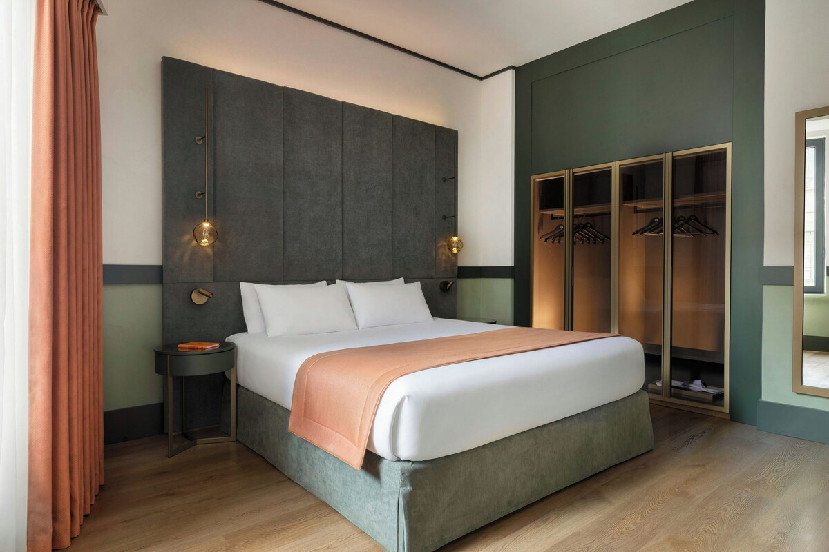 Premium bedding, down comforters, memory foam beds, minibar