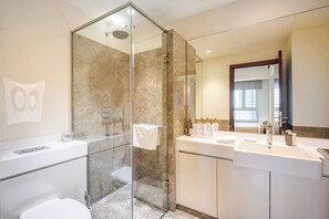 Shower, bidet, towels, soap