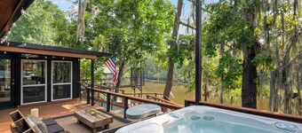 Relax and unwind at The Whiskey Barrel, a cozy waterfront retreat designed for fun and laid-back lake living. Soak in your private hot tub, paddle out with the kayaks, or spend the afternoon on one of the 4 decks reading a good book