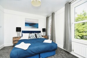 3 bedrooms, desk, iron/ironing board, travel cot