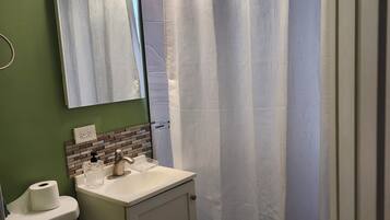 Hair dryer, towels, soap, shampoo