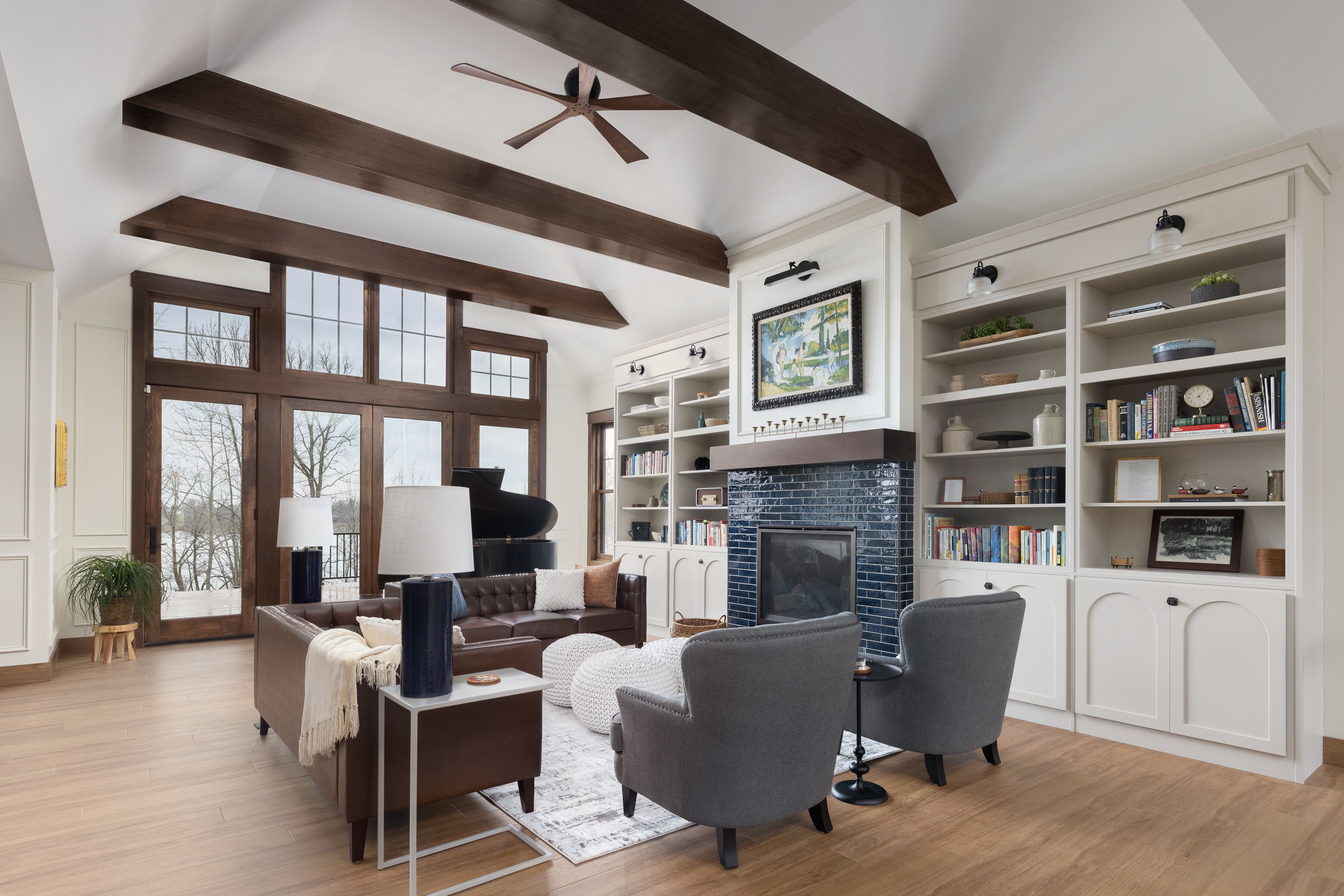 Smart TV, fireplace, books, computer monitors