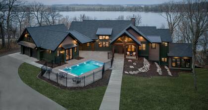 Private lakeside retreat with pool, hot tub, and sauna
