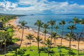 On the beach, sun-loungers, beach towels