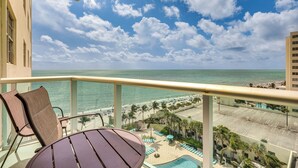 A balcony with a view of the beach and ocean. - Hollywood Condo w/ Beach Access - Walk to Shore! (Hollywood)