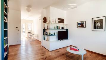 Condo, Balcony | Living area | 30-inch TV with digital channels