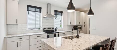 Townhome, 2 Bedrooms | Private kitchen | Fridge, oven, coffee/tea maker, electric kettle