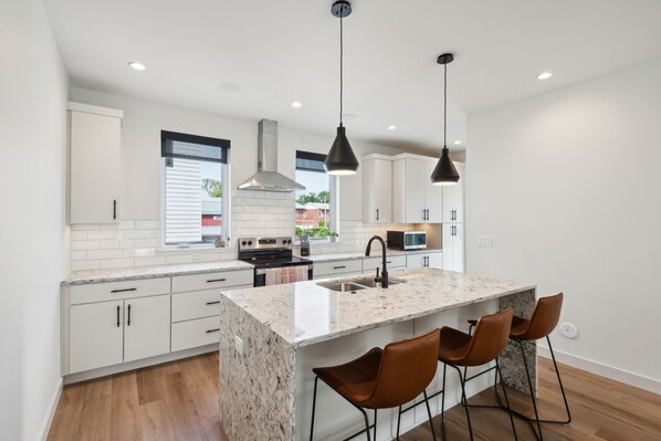 Townhome, 2 Bedrooms | Private kitchen | Fridge, oven, coffee/tea maker, electric kettle