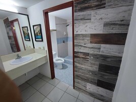 Classic Single Room | Bathroom | Shower, towels, soap, toilet paper