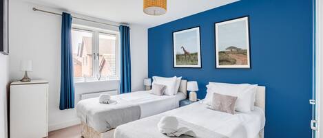 3 bedrooms, desk, iron/ironing board, travel cot