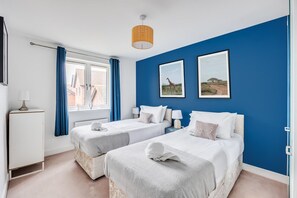 3 bedrooms, desk, iron/ironing board, travel cot