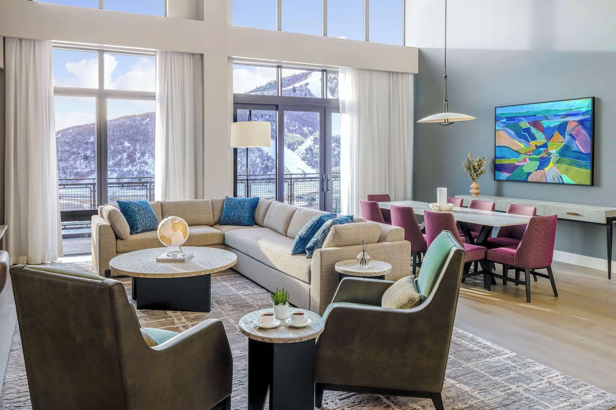 55-inch flat-screen TV with satellite channels, fireplace, pay movies