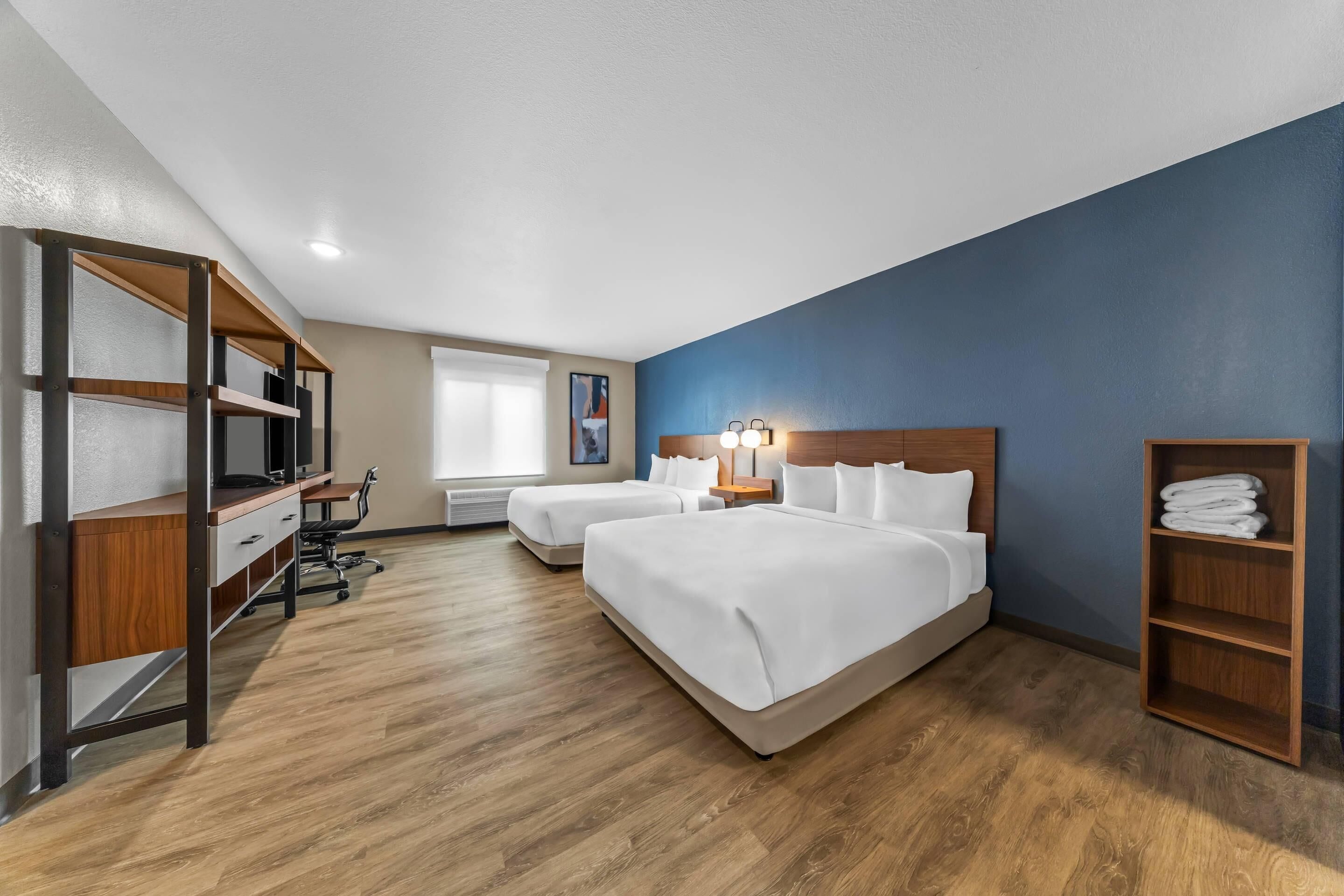 Desk, laptop workspace, blackout curtains, free WiFi