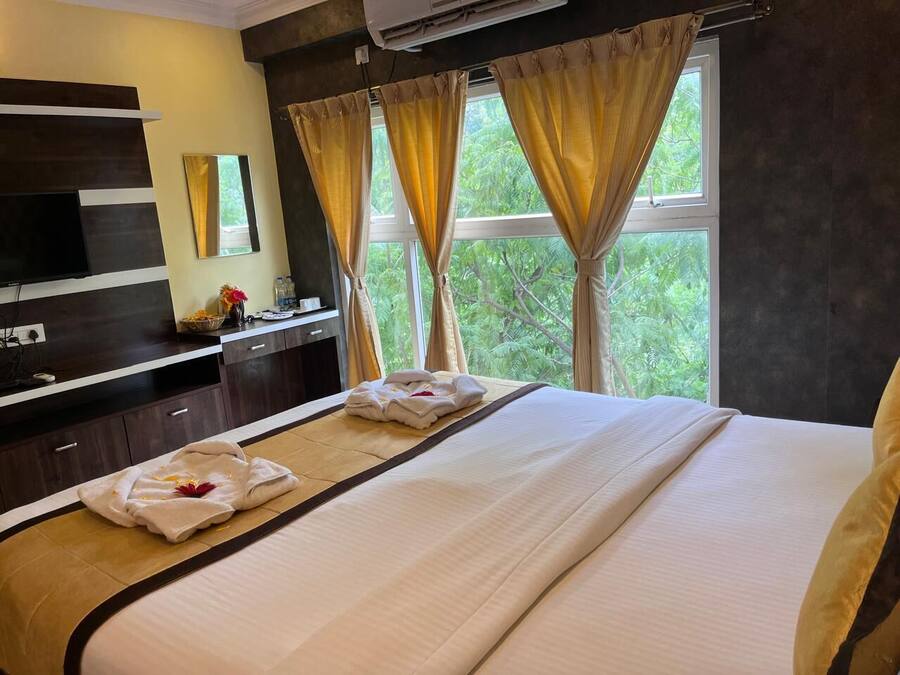 Memory-foam beds, desk, laptop workspace, iron/ironing board