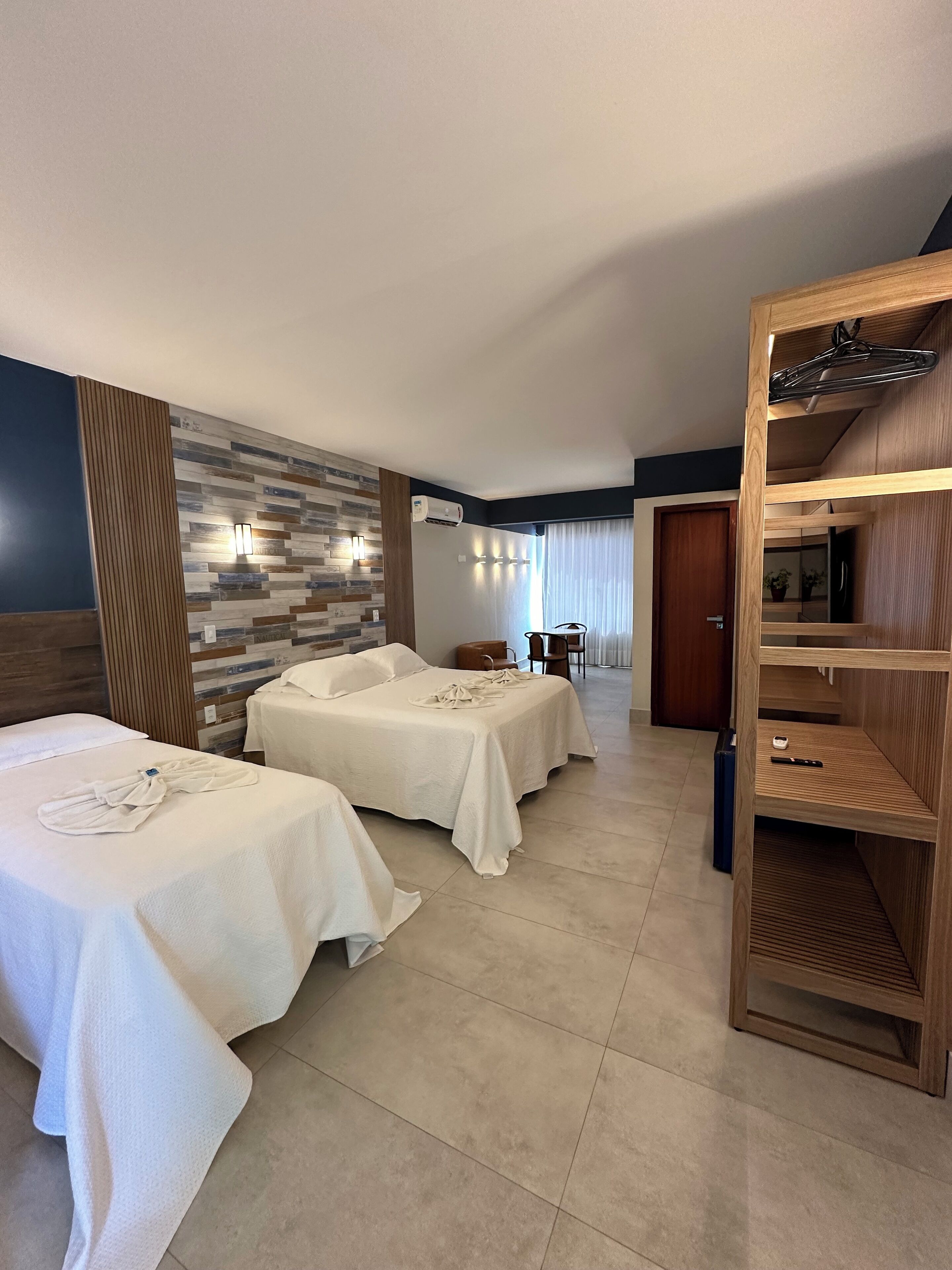 Family Room (Deluxe Com Vista Mar) | Minibar, bed sheets