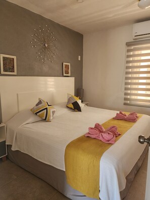 1 slaapkamer, een kluis op de kamer, een strijkplank/strijkijzer