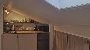 Fridge, microwave, stovetop, coffee/tea maker