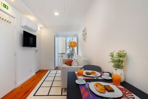 Apartment, 1 Bedroom | Living area | Flat-screen TV
