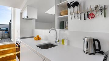 Departamento, 2 habitaciones | Cocineta privada | Tetera eléctrica