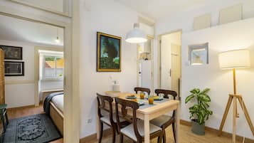Apartment, 1 Bedroom | Living area | Flat-screen TV