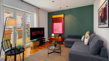 Apartment, 3 Bedrooms | Living area | Flat-screen TV